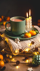 Warm cocoa, burning candles, and tangerines create a cozy atmosphere on christmas or new year's eve, surrounded by glowing lights and pine cones, greeting card
