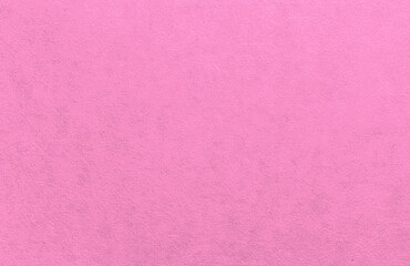 The texture of pink plain wallpaper with a slight sheen and slightly voluminous