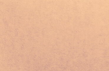 Wallpaper with a plaster texture in dark beige tones, close-up without any objects