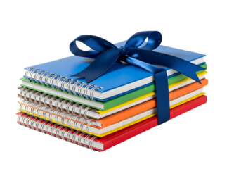 A vibrant stack of colorful notebooks and binders neatly tied with a bright red ribbon, symbolizing a thoughtful gift of organized learning materials for education