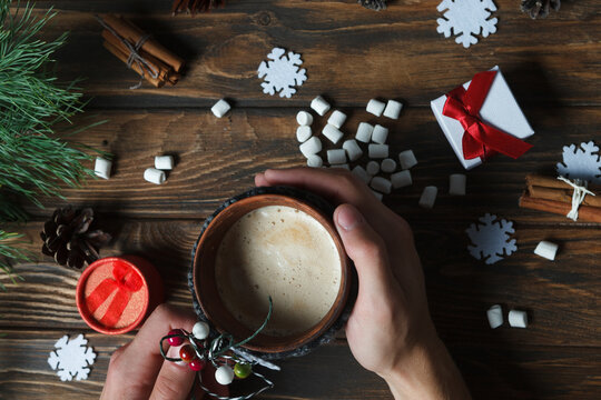young man holding a bowl of nuts