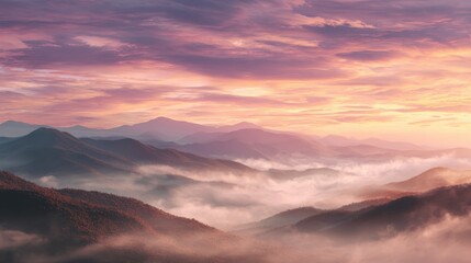 Fototapeta premium Pink and Purple Sunset Over Misty Mountain Landscape – Serene Outdoor Scene, Atmospheric Nature View, Tranquil Hills and Scenic Wilderness Photography