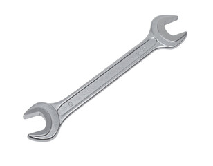 Silver metal combination wrench tool isolated on black background