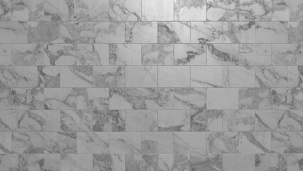 Elegant and modern grey marble tile pattern creating a sophisticated textural background for contemporary interior design projects and luxurious surface applications