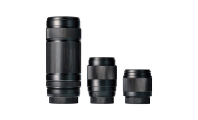 Three dark, cylindrical objects of varying sizes, likely components.  Textured surfaces, appearing metallic