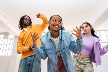 Fototapeta na wymiar Young group of multiethnic hip-hop dancers dancing