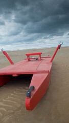 rescue boat on the empty beach of rimini in italy during autumn