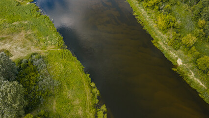 Aerial View of a River and Vegetation in Nowy Lubiel, Poland