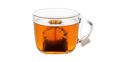 Glass mug filled with amber tea and submerged tea bag on background beverage