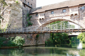 Kettensteg Bridge At River Pegnitz In Nuremberg, Germany. 