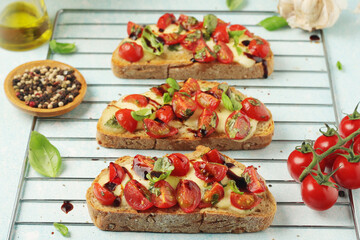 Freshly made bruschetta sandwiches - traditional dish of Italian cuisine