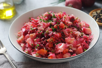 A bowl with Vinegret salad, a typical Russian dish