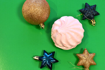 Merry Christmas greeting card with images of Christmas tree decorations, glass balls, stars and sweets.