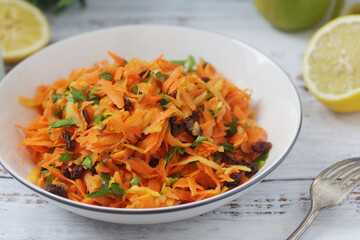 A bowl with traditional Polish carrot salad  © nastyakamysheva