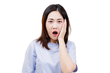 Fototapeta premium Asian young beautiful woman displays a surprised expression, with her hand on her cheek, conveying shock or disbelief.