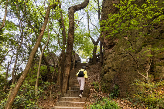 Hiker hiking the serene Boshi hill near West Lake in Hangzhou, China