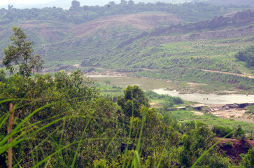 Naklejka premium Beautiful landscape of green valley bank of Sohan river