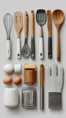 Kitchen tools arranged on a light gray background