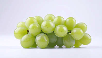 Close-up of a vibrant bunch of fresh green table grapes with dewdrops, isolated on a bright white background, symbolizing health and natural sweetness