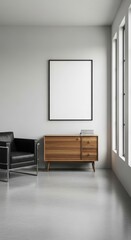 Fototapeta premium Modern interior with a black armchair, wooden cabinet, and empty picture frame on a light wall