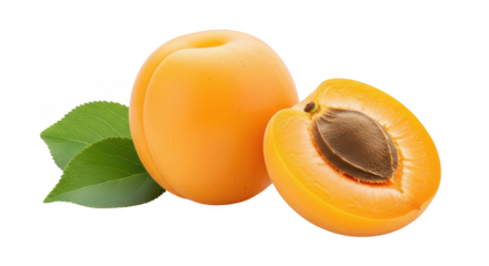 Whole and halved ripe orange apricot with green leaves on fruit