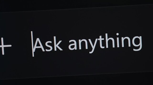 The text "Ask anything" on screen. Type prompt in generative AI assistant. Ideal for projects related to artificial intelligence, chatbot technology.