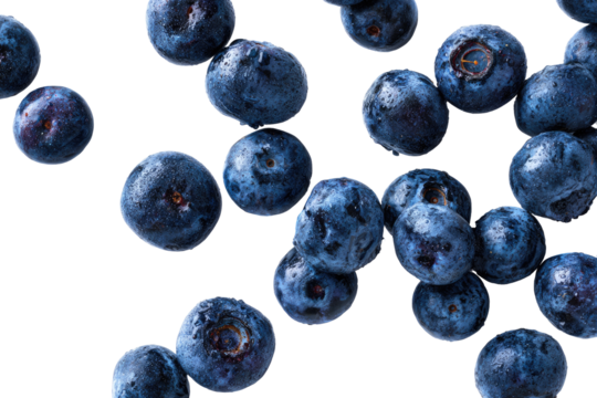 Fresh blueberries scattered on a black background