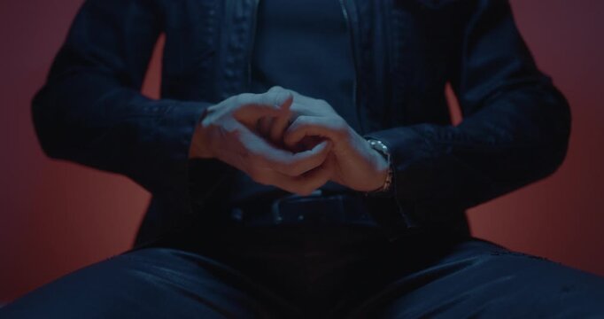 Anxiety and nervousness due to drug addict withdrawal concept video. Man scratching hands nervously with stress. 