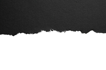 Dark gray textured surface with torn paper edge