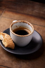 Cup of coffee on wooden background. Soft focus. Copy space	