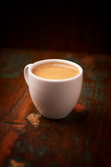 Cup of coffee on wooden background. Soft focus. Copy space	