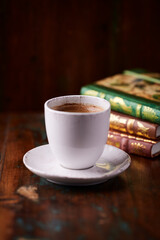Cup of coffee on wooden background. Soft focus. Copy space	