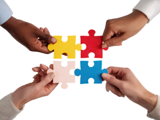 Diverse hands fitting colorful puzzle pieces