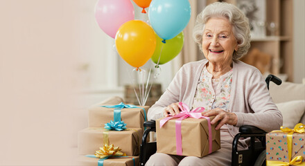 Elderly woman with smile in wheelchair opening presents at birthday party  