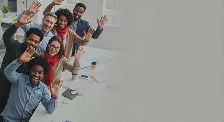 Diverse team of professionals coworkers smiling and waving at camera in modern office  