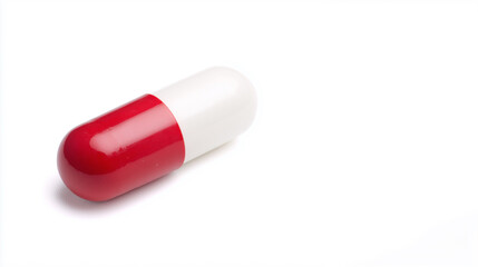 Macro close-up red and white cellulose capsule isolated medicine