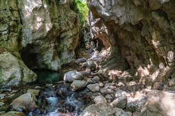 Resurgence of Sammaro River on a sunny summer day. Near Roscigno, in Cilento National Park, Campania, Italy