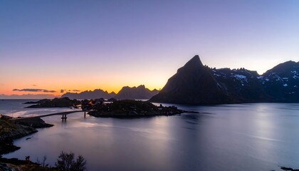 A tranquil harbor scene at sunset, showcasing a picturesque bridge connecting islands, surrounded by dramatic mountains and a calm body of water.