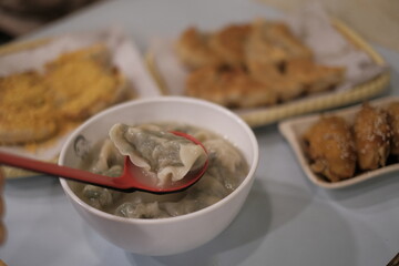 Boiled small dumplings with pork in the Chinese restaurant 