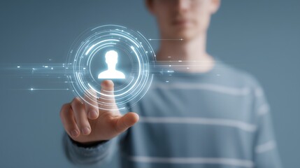 A man is pointing at a face on a screen. The image is of a man in a suit, wearing a tie, and pressing a button. The man is focused on the face, and the image conveys a sense of importance