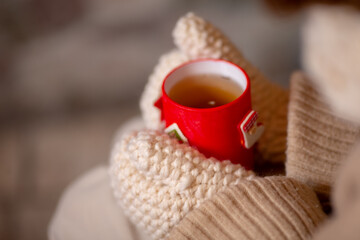 cup of coffee with cinnamon sticks