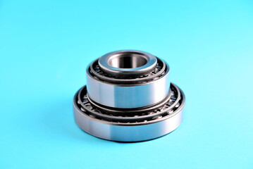 roller bearing on blue background with side lighting