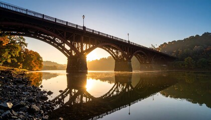 Fototapeta premium Sunrise River Bridge Autumn Reflection.