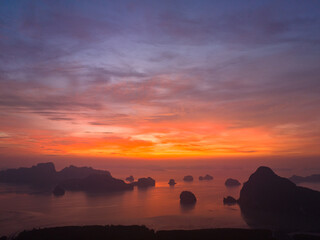 aerial view Amazing light of nature cloudscape sky above Samed Nang Chee Phang Nga archipelago....