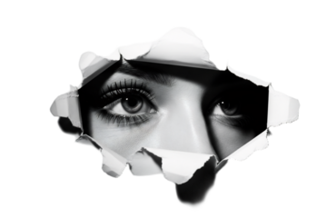 A close-up of a woman's eye peering through a torn paper hole. The eye is striking with long eyelashes and a subtle makeup look. The background is transparent.