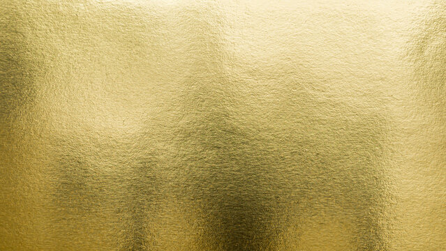 Gradation gold foil leaf shiny matt with sparkle yellow metallic texture background.
Abstract paper glitter golden glossy for template.
top view.