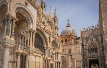 Fototapeta premium Ornate facade and dome of St Mark’s Basilica in Venice