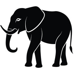 Fototapeta premium Silhouette of a majestic african elephant walking with tusks