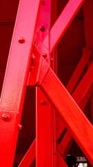 Close-up of red metal framework