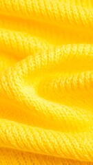 Close-up of vibrant yellow fabric texture